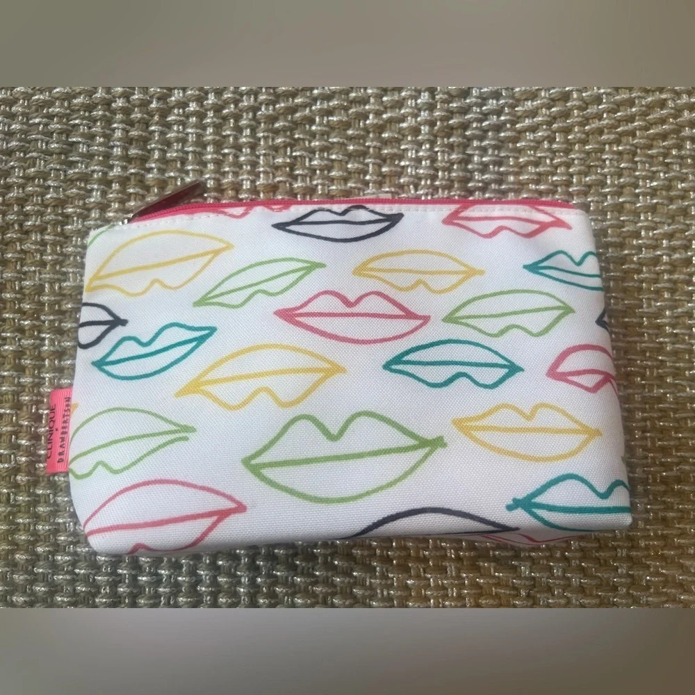 Clinique cosmetic makeup collection - bag, mascara, eyeliner, and makeup remover